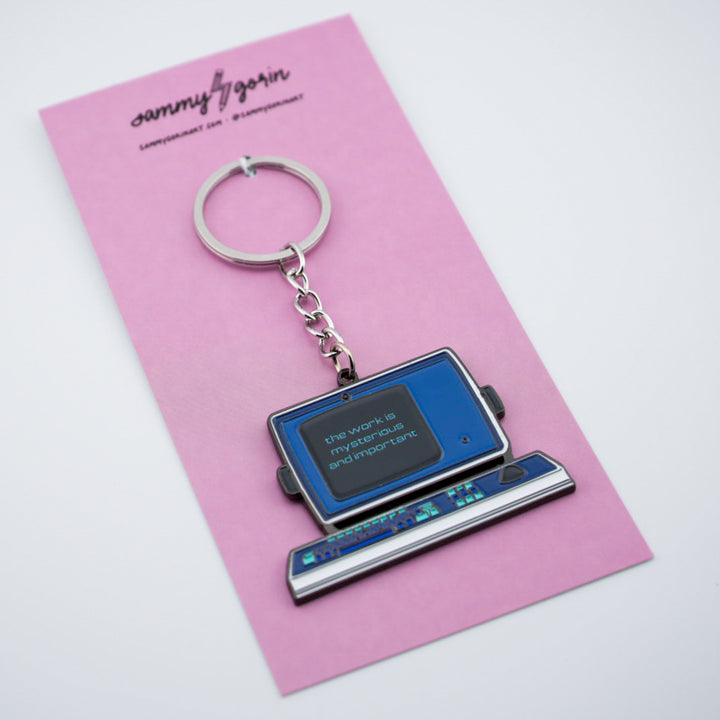 Mysterious Work Enamel Keychain